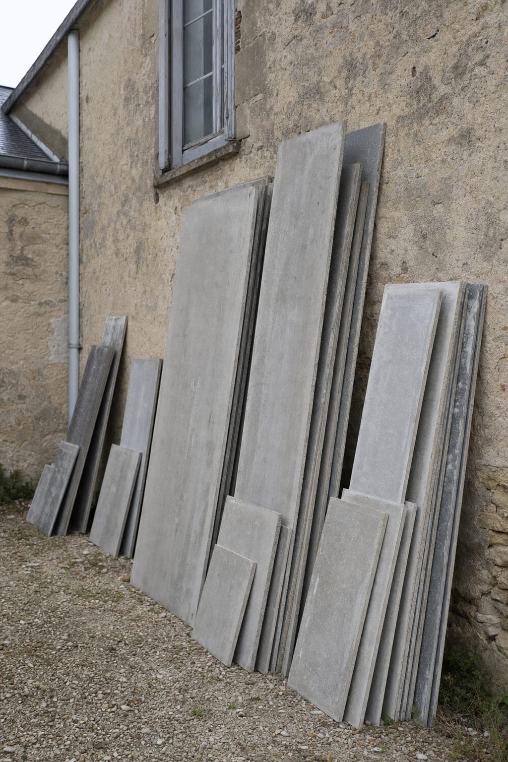 Plaques planes de façade en fibrociment